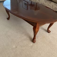 Oval teak coffee table - highly polished finish