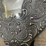 Vintage Ornate Silver-Tone Hand Mirror Floral Embossed Design. Image 3