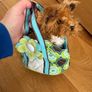 Dog stuffed animal in bag Image 2