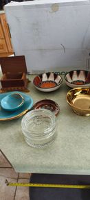 7 trinkelt itmes Large Mint Green Fern Bowl and small bowl DANU Designer Ceramics 20.00 E.Crystal glass lided trinklet dish 15.00 E.Gold dish 10.00E.  Southe afirca bowl smale on 8.00 E. other        larger one 10.00E.  Marccoin one 8.00E.  wood trinklet 
