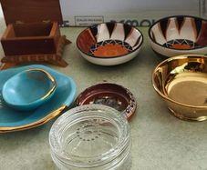 7 trinkelt itmes Large Mint Green Fern Bowl and small bowl DANU Designer Ceramics 20.00 E.Crystal glass lided trinklet dish 15.00 E.Gold dish 10.00E.  Southe afirca bowl smale on 8.00 E. other        larger one 10.00E.  Marccoin one 8.00E.  wood trinklet 