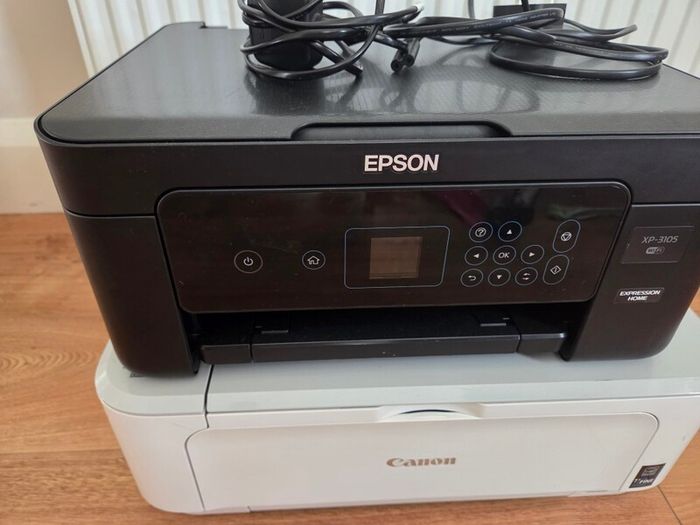 Canon and epson printer, not been used for a while, not sure working perfect