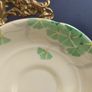 Lovely Set of Six Vintage English Bone China Hand Painted Saucers, (For Use as Petit Fours Plates), with Green Flowers on a Creamy Yellow Base Glaze. Image 4