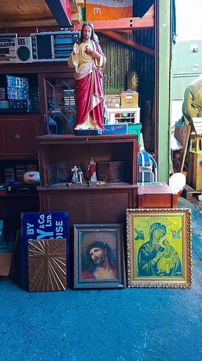 Antique holy statue and pictures