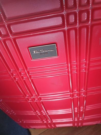 huge suitcase, metallic Shell suitcase, H 78, W 35, 4 rotating wheels, sturdy handle, zips working perfectly,