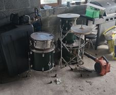 battered drum kit