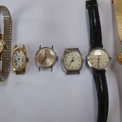 Six vintage hand winding watches all running.