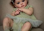 Reborn Doll Lifelike 23 Inch Baby Doll Like Real Baby Silicone Baby Girl with Soft Fabric Body Reborn Babies