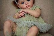 Reborn Doll Lifelike 23 Inch Baby Doll Like Real Baby Silicone Baby Girl with Soft Fabric Body Reborn Babies