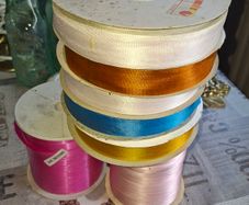 Approx 1300 metres of Ribbons on Reels, suitable for various crafting and decoration purposes Postage Available