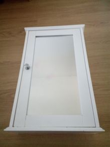Bathroom cabinet in white wood with a mirrored door