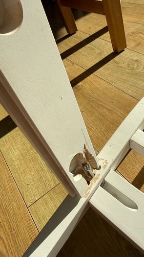 white chair that just broke