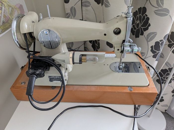 Vintage cased Sovereign electric sewing machine