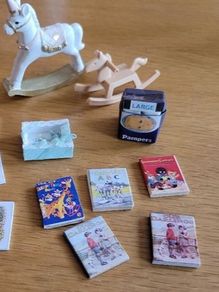 Baby items for dolls house nursery