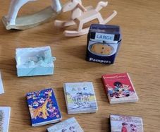 Baby items for dolls house nursery