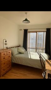wooden double bed