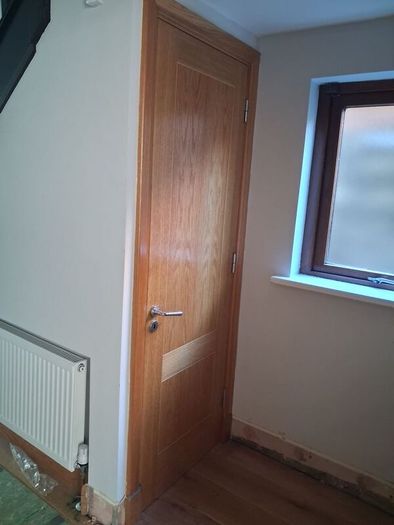 Oak Doors, solid oak frames, architrave and skirting.