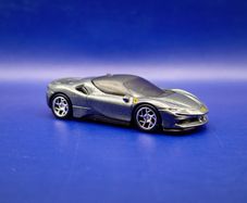 Hot Wheels Ferrari SF90 Stradale with custom wheels.