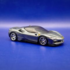 Hot Wheels Ferrari SF90 Stradale with custom wheels.