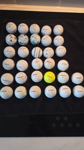 32 taylormade and titlest balls