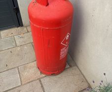 Full, sealed, unused 34kg propane cylinder