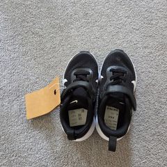 Kids size 7.5 UK Nike revolution 7 black and white trainers