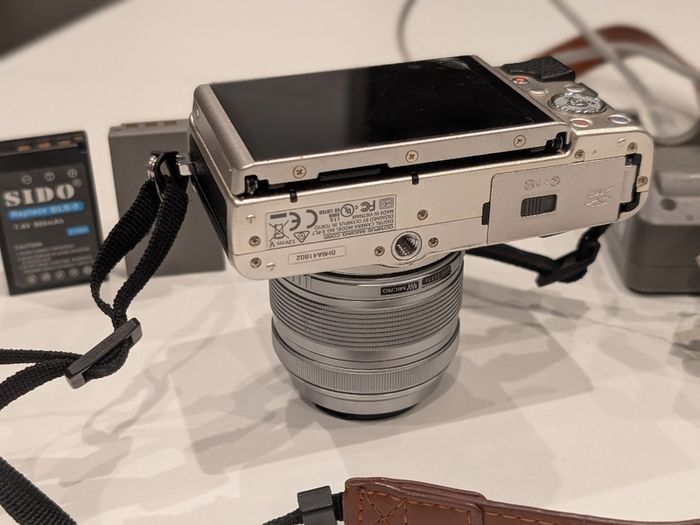 Olympus PEN Lite E-PL7 with 14-42mm lens and accessories