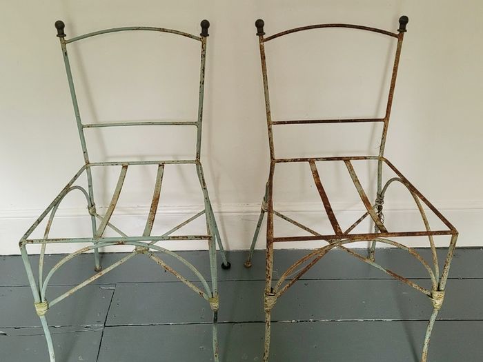 Antique pair of french wrought iron garden chairs