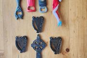 8 Items. 4 X Cast Metal Bottle Openers, A Cast Wallmounted Celtic Cross, 3 Harps For Decorative Purposes.