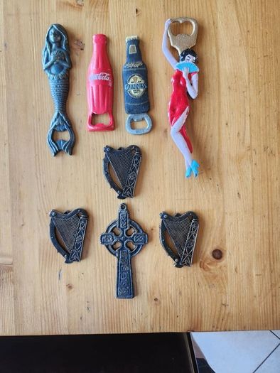 8 Items. 4 X Cast Metal Bottle Openers, A Cast Wallmounted Celtic Cross, 3 Harps For Decorative Purposes.