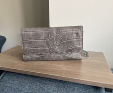 Guess purse. Never used. Slightly worn on inside.