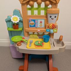 Fisher-Price Laugh & Learn Grow-the-Fun Garden to Kitchen