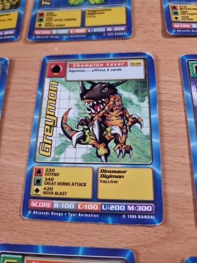 13 Champion level Digimon cards. 1999.