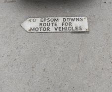 old aluminum road sign
