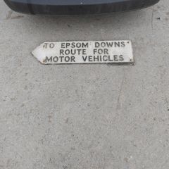 old aluminum road sign