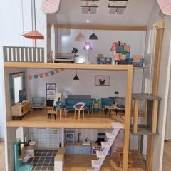Big wooden doll house in very good condition.