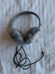 On-ear earmuffs with built-in headphones (corded)