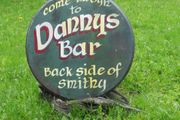 Dannys Bar, Old Irish Pub advertisement sign made on Oak barrel lid