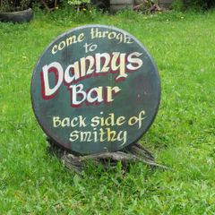 Dannys Bar, Old Irish Pub advertisement sign made on Oak barrel lid