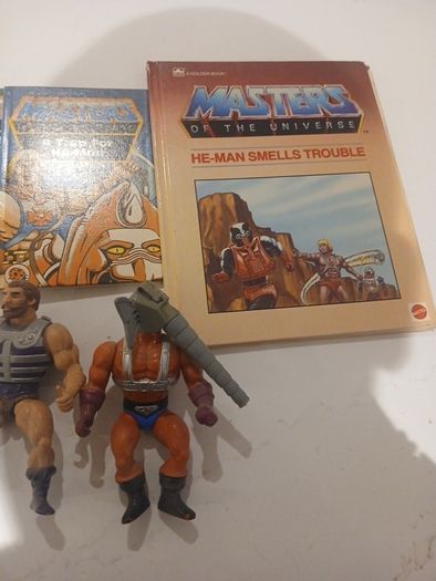 He man action figures and books