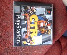 Crash Team Racing PS1 disk and booklet