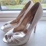 Ivory satin peetoe high heel shoes by Dune London with a pleated bow trim accented with rhinestones Image 4
