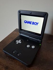 Gameboy Advance SP (refurbished) & game