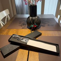 Brand new Japanese style Nakiri knife with a beautiful Damascus steel pattern blade.