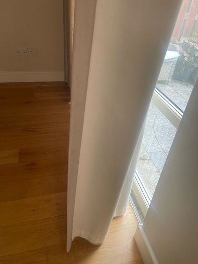 Wave fold curtain and slim line ceiling track