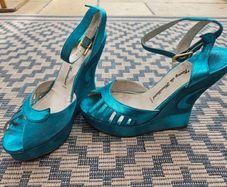 Turquoise Margaux wedges by Terry de Havilland