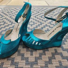 Turquoise Margaux wedges by Terry de Havilland