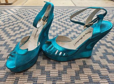 Turquoise Margaux wedges by Terry de Havilland