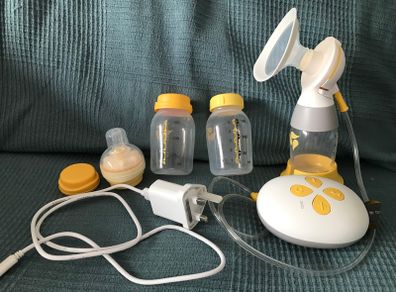 Medela Solo breast pump (mobile) PLUS extras
