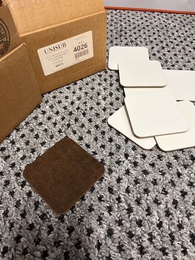 Coasters, plain white, new in box, about sixty five